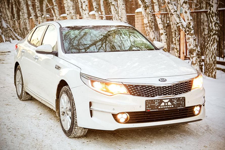 Новый автомобиль бизнес класса Kia Optima NEW белого цвета