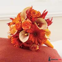 Оранжевый букет невесты из роз, калл и гербер 