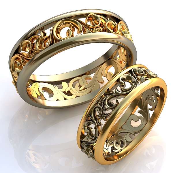 Обручальные кольца из белого и желтого золота с узорами - фото 998093 Ювелирная студия Dolce vita