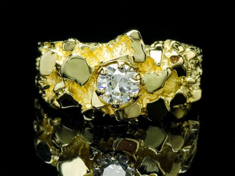 Мужское золотое кольцо с бриллиантом 0.66 карат